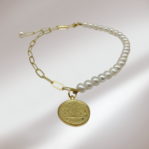 Gold tag pearl necklace